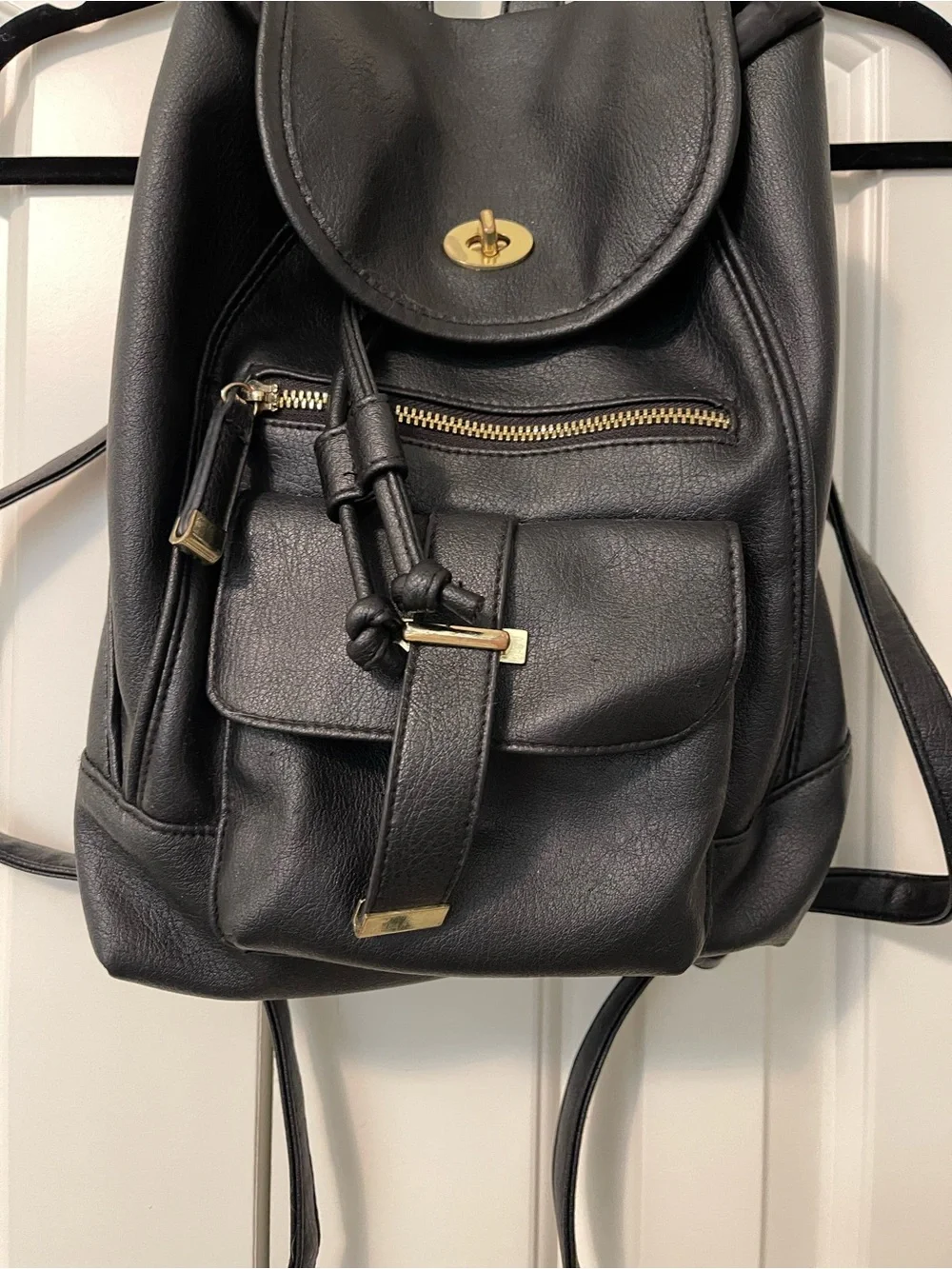 Sleek Black Faux Leather Mini Backpack with Gold Accents